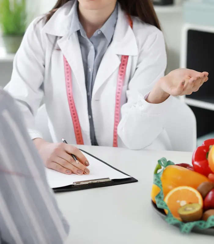 young woman visiting nutritionist weight loss clinic